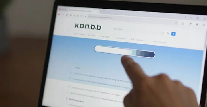 Website loading spinner on a computer screen